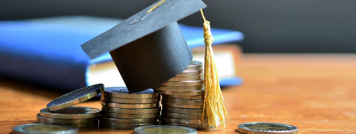 Mortar board on coins